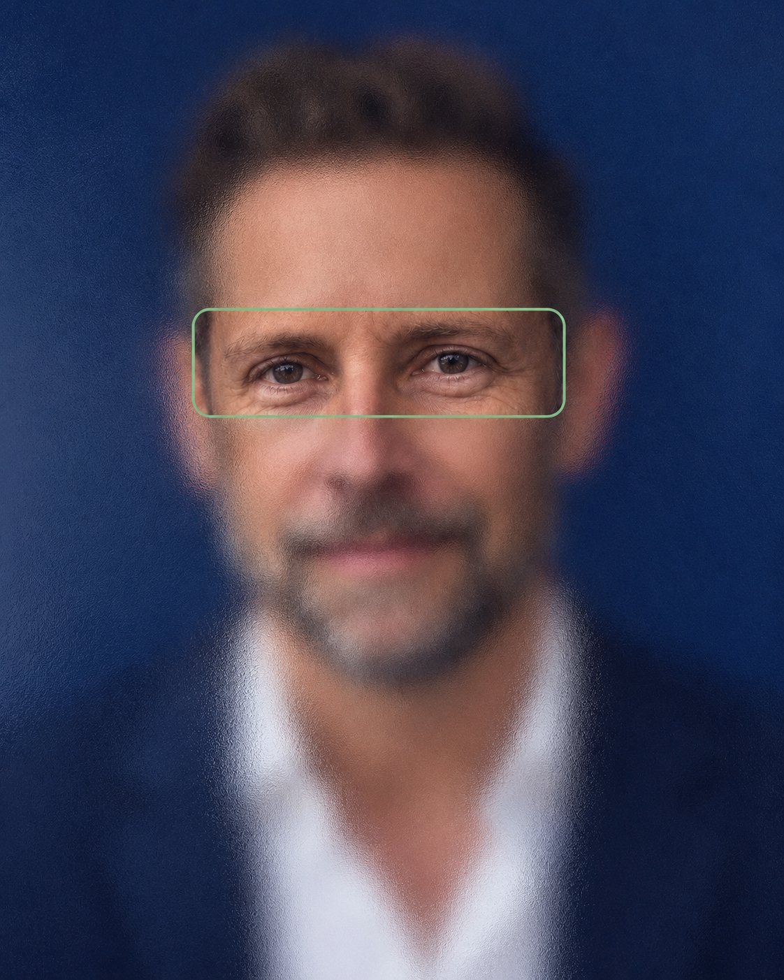 A leader's face, blurred except for the eyes, framed in a sage window